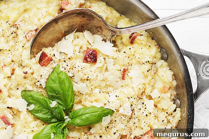 Baked Carbonara Risotto in a rustic skillet, ready to serve.