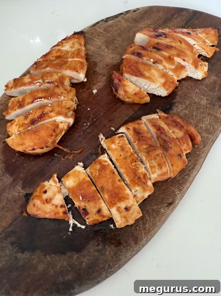 Finished grilled chicken with peach bbq sauce, ready to serve.