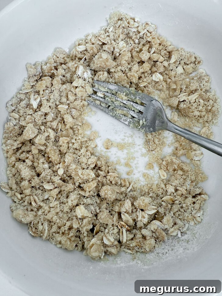 Crisp topping mixed up in a small bowl.