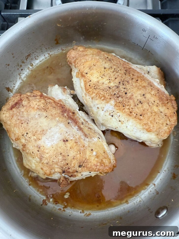 Adding maple syrup and sherry vinegar to the hot skillet for the glaze.