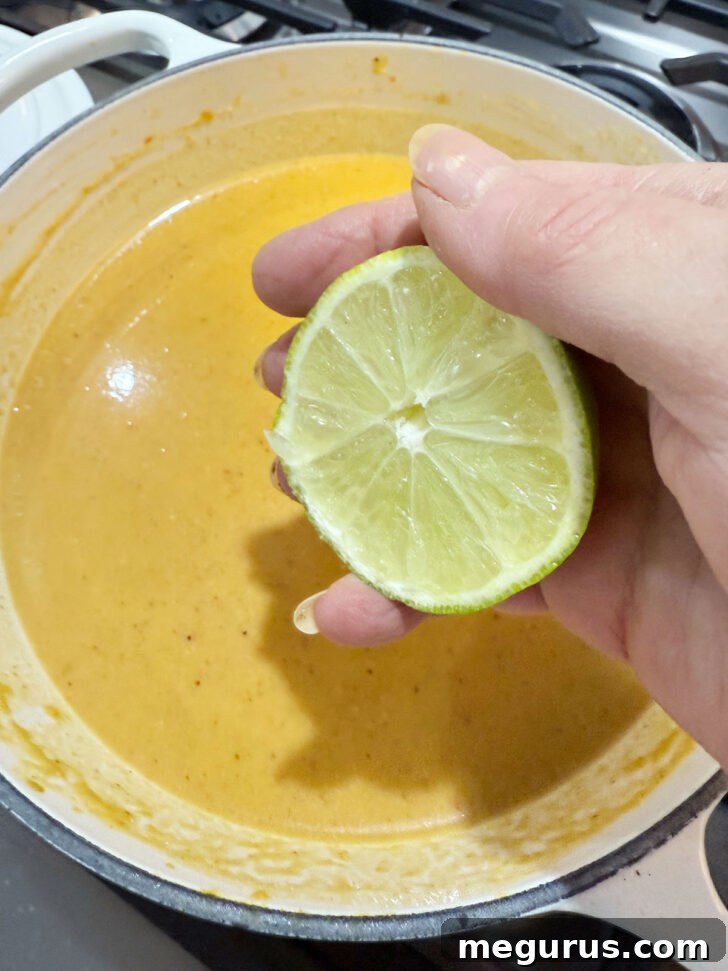Finishing the sweet potato soup with lime juice.