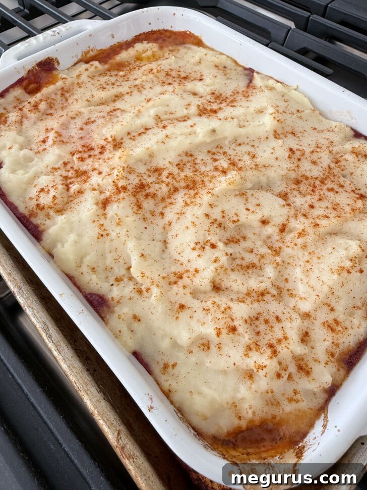 The fully baked meatloaf casserole, golden and bubbling.