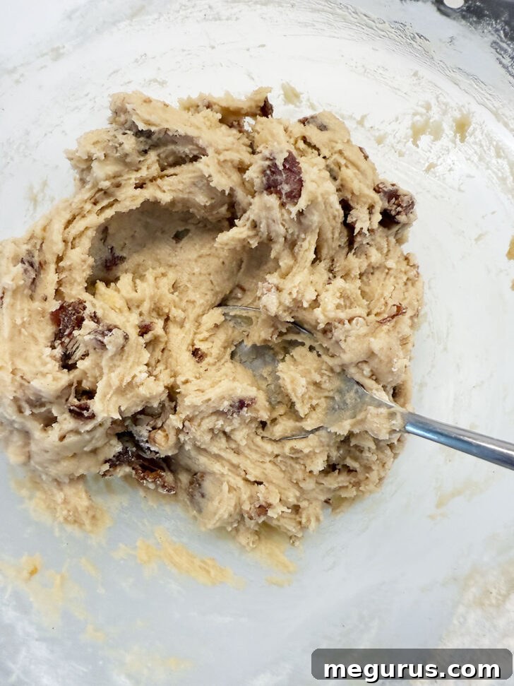 Completed batter with dates and nuts, ready for baking.