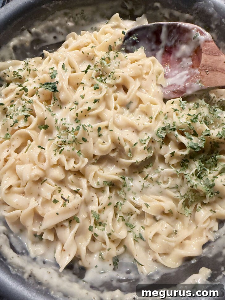 Parsley added to the cafeteria noodles.