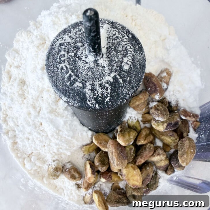 Dry ingredients for the base in a food processor.