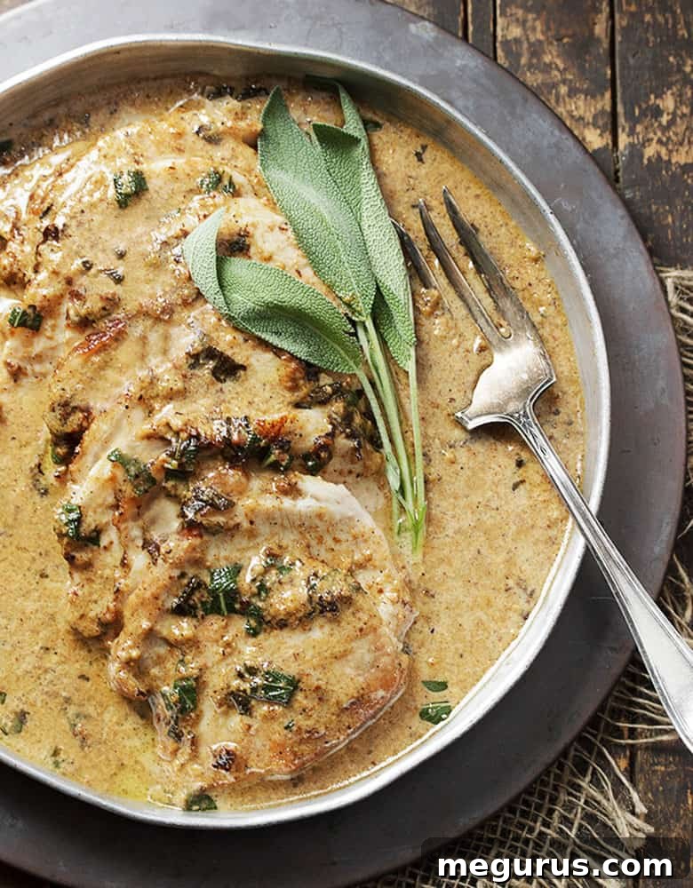 Close-up of tender, succulent milk-braised pork loin slices, glistening with rich gravy.