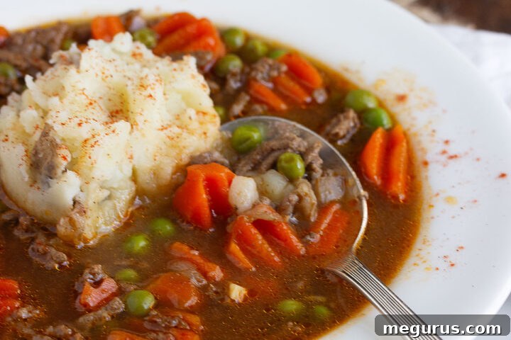 Shepherd's pie soup in bowl with spoon