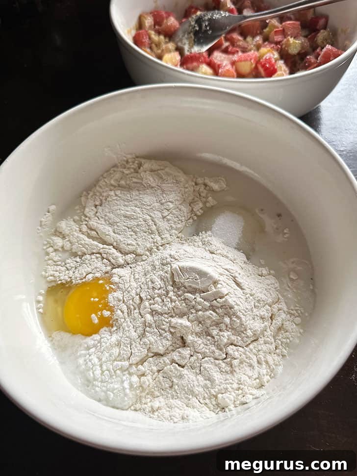 Mixing the batter ingredients in a separate bowl until smooth.