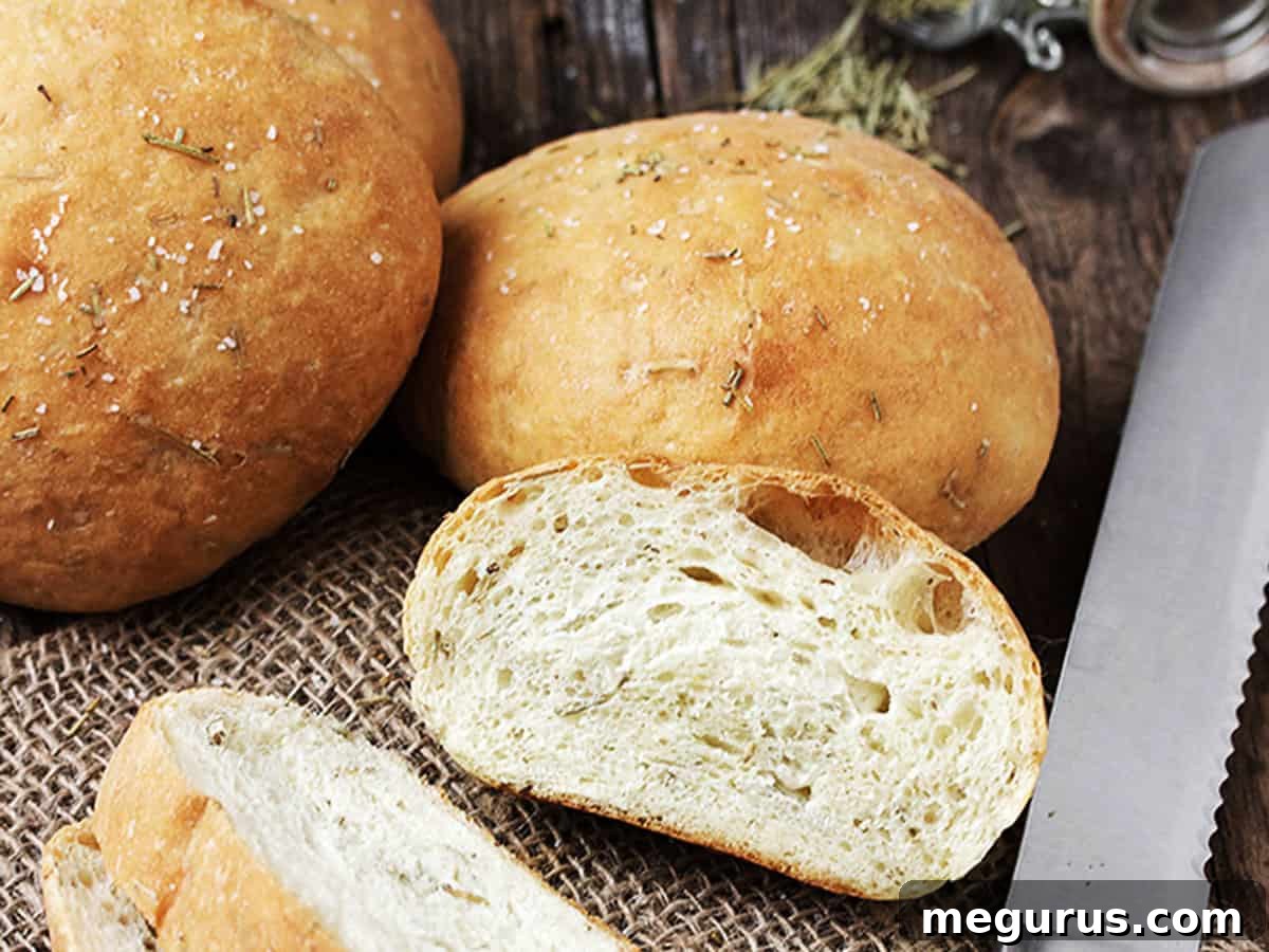 Sliced mini rosemary olive oil bread ready for dipping