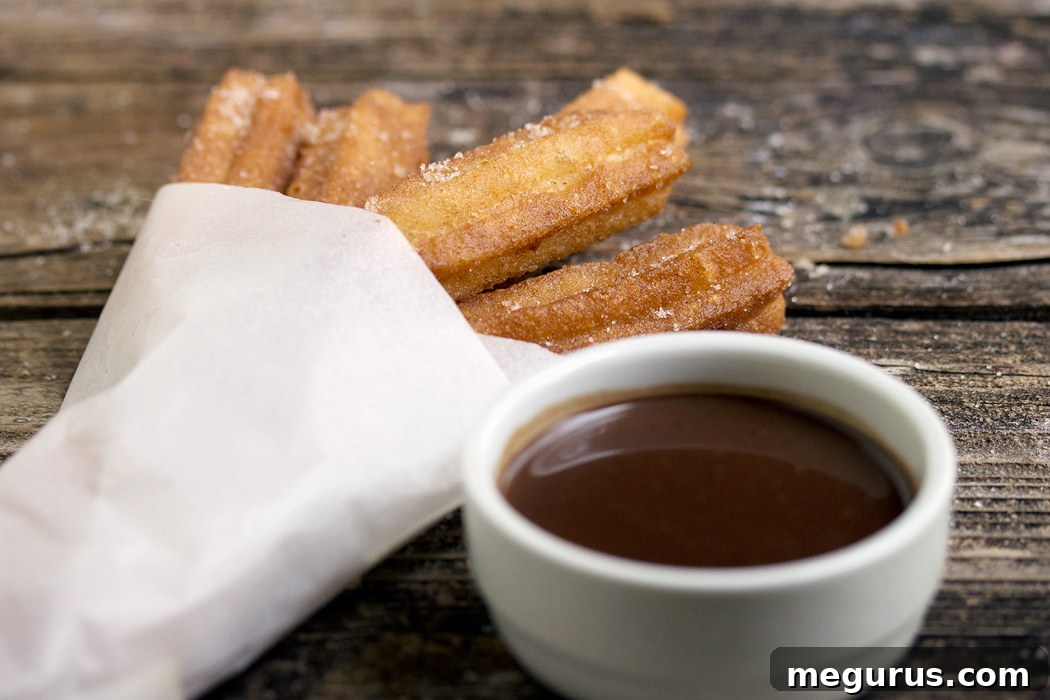 Crispy Churros con Chocolate with rich dipping sauce