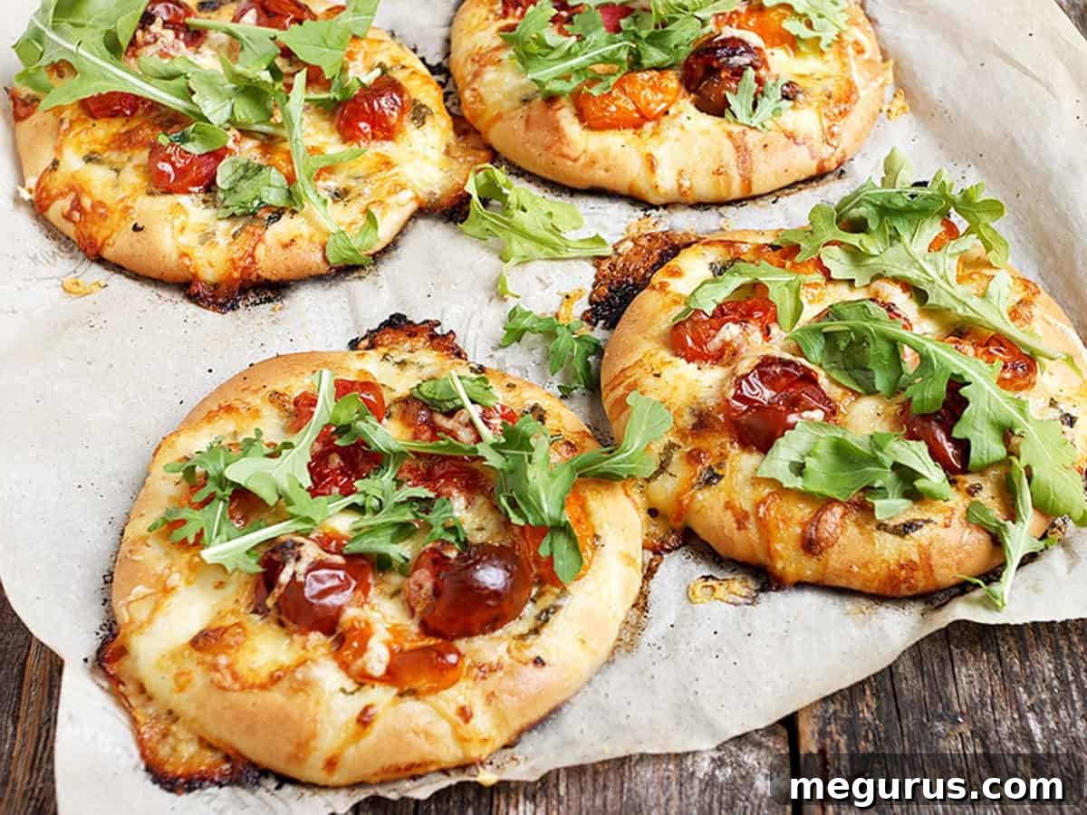 mini pizza with cherry tomatoes and bocconcini