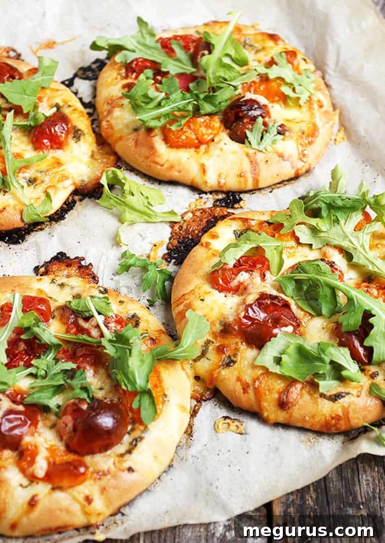 mini pizza with cherry tomatoes and bocconcini