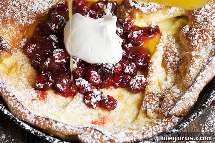 Cranberry Dutch Baby with orange syrup