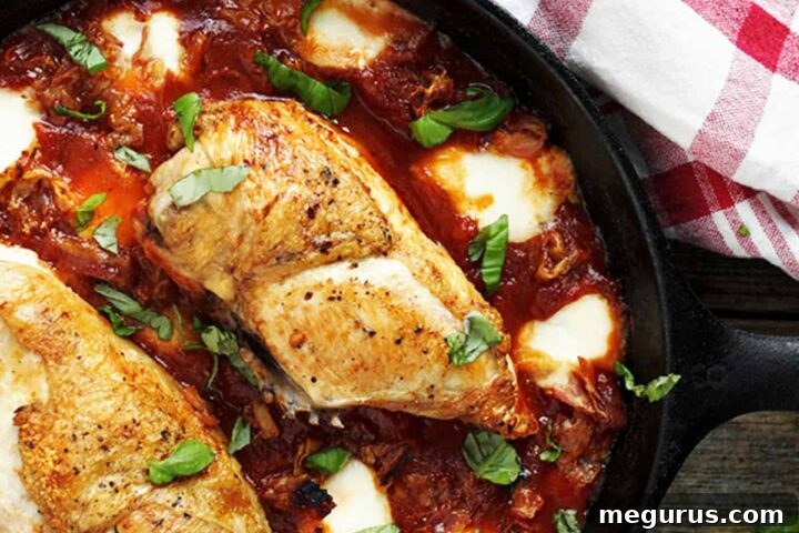 chicken breasts with tomato sauce and bocconcini in skillet