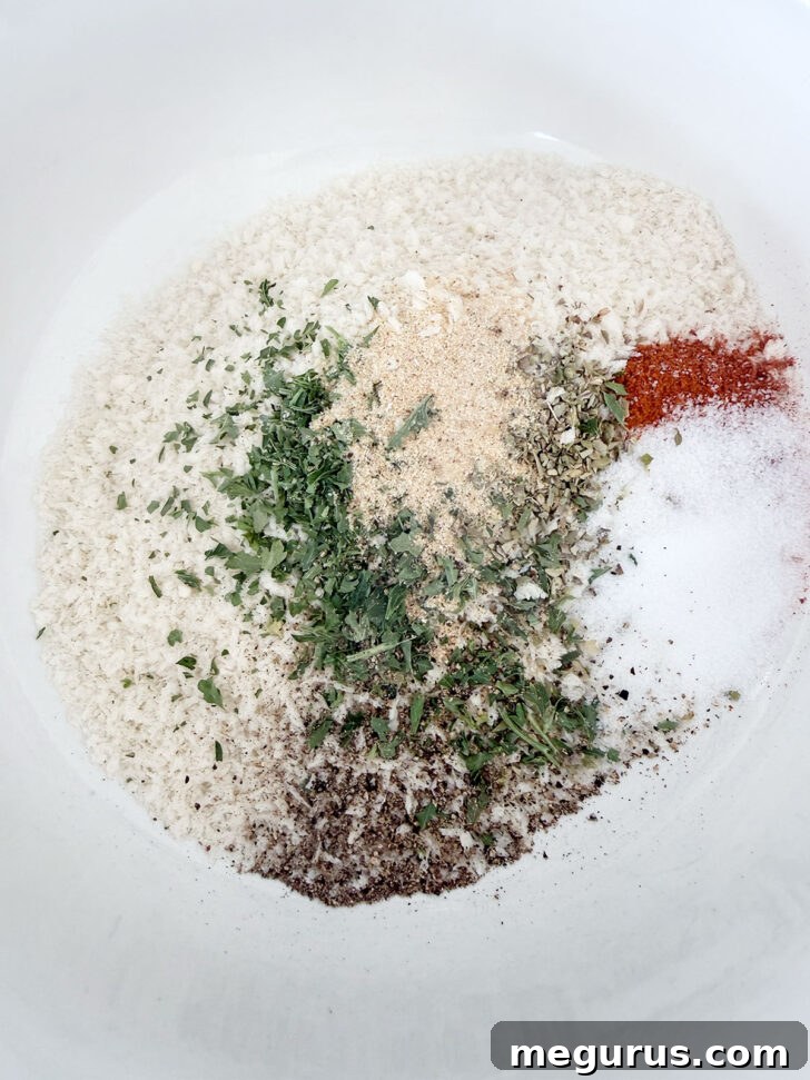 Ingredients for panko breading in a mixing bowl before oil is added.