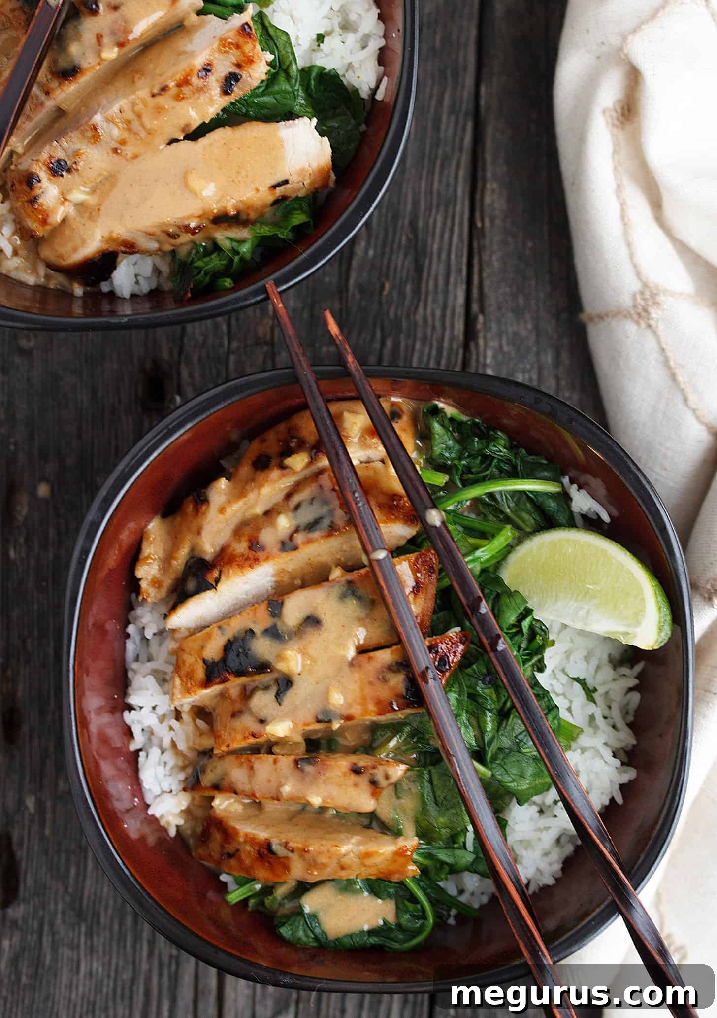 Close-up of a Pork Rice Bowl with Peanut Sauce, showcasing the rich sauce and tender pork.