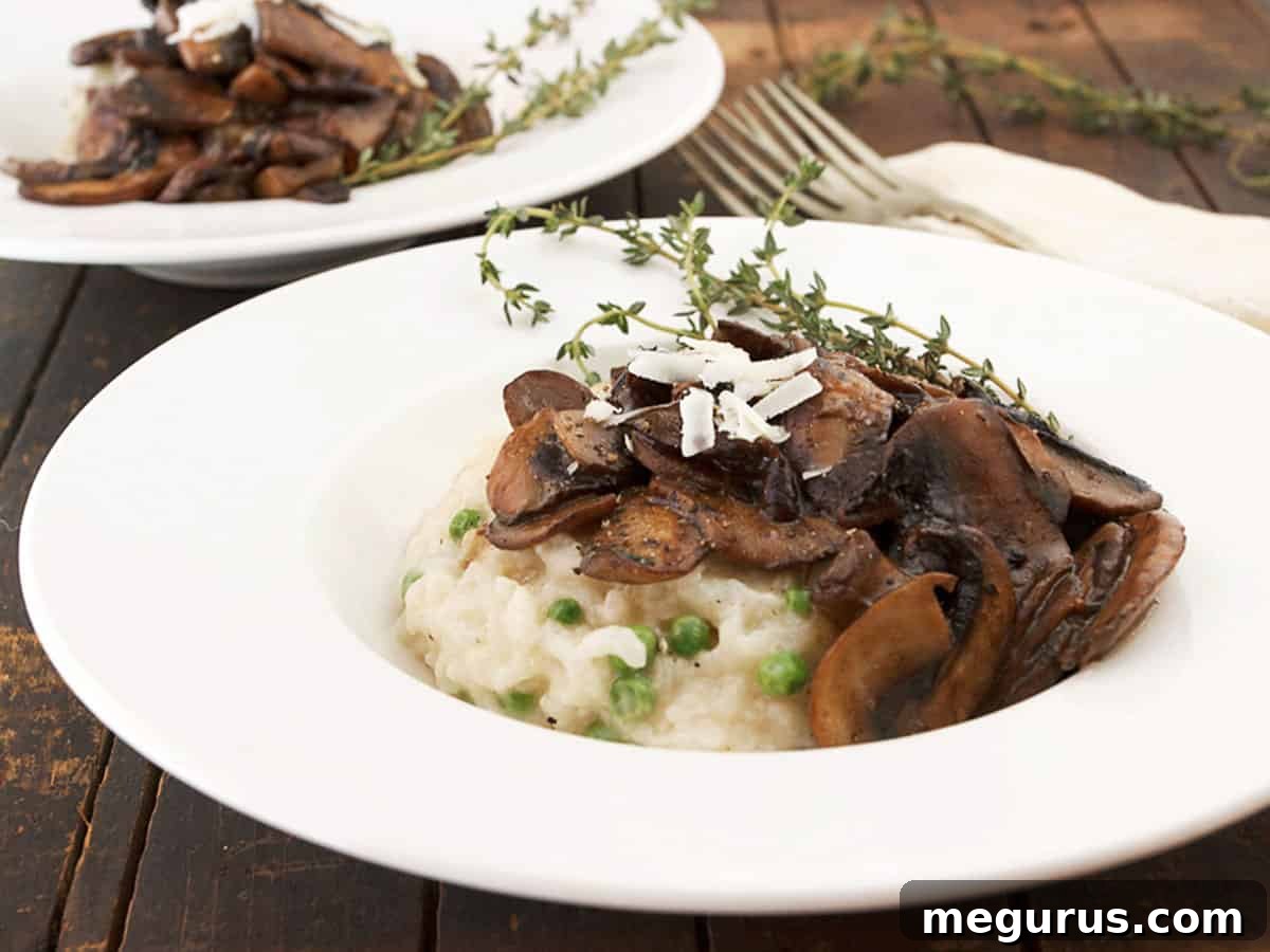 Creamy baked Parmesan risotto topped with rich Marsala wine mushrooms, ready to serve.
