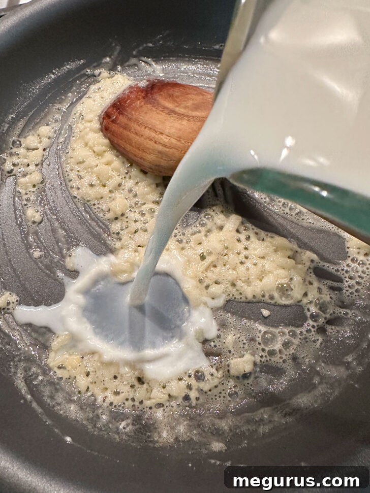 Add milk to butter and onion mixture.