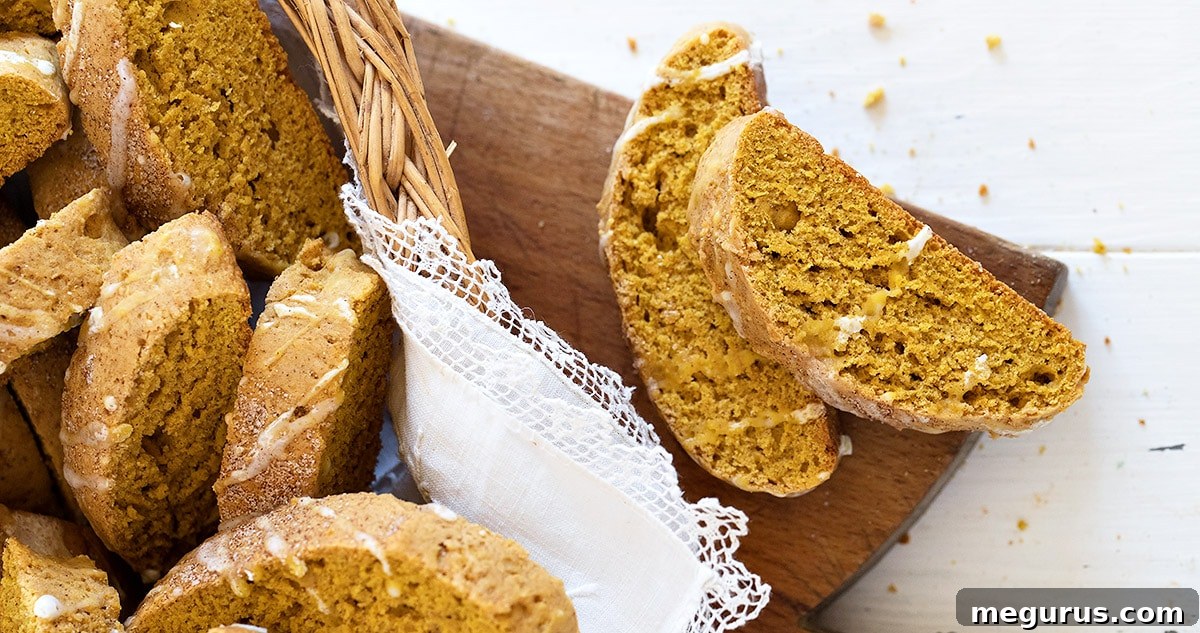Delicious pumpkin biscotti arranged elegantly in a rustic basket, ready for autumn enjoyment.