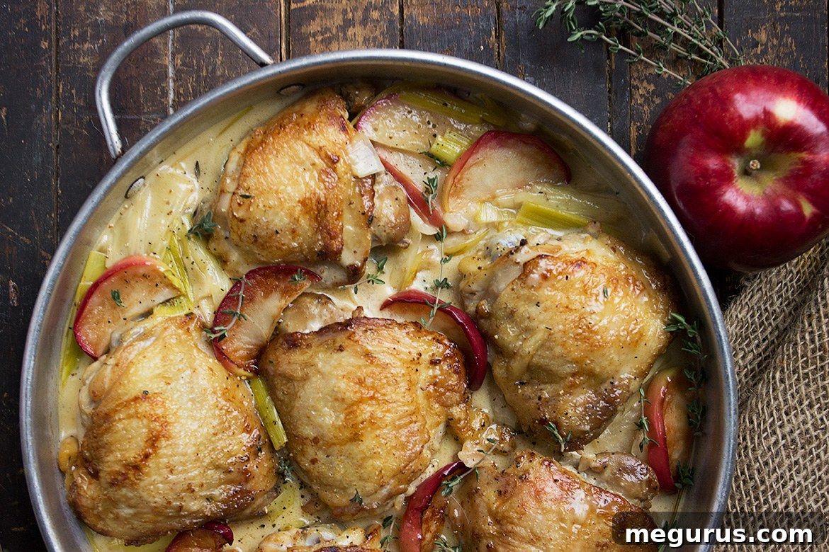 French-Inspired Chicken with Leek and Apples served in a pan