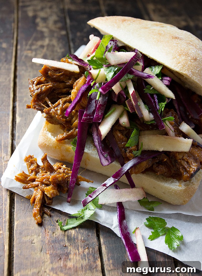 Apple Pulled Pork and Coleslaw on a bun