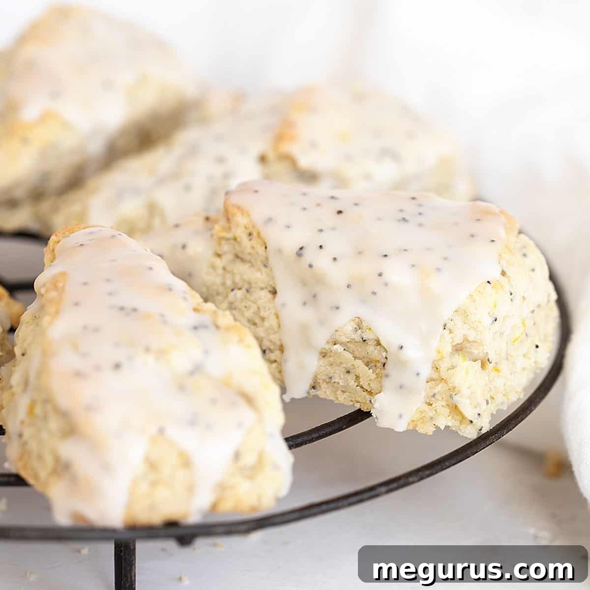 lemon poppy seed scones on cooling rack, freshly baked