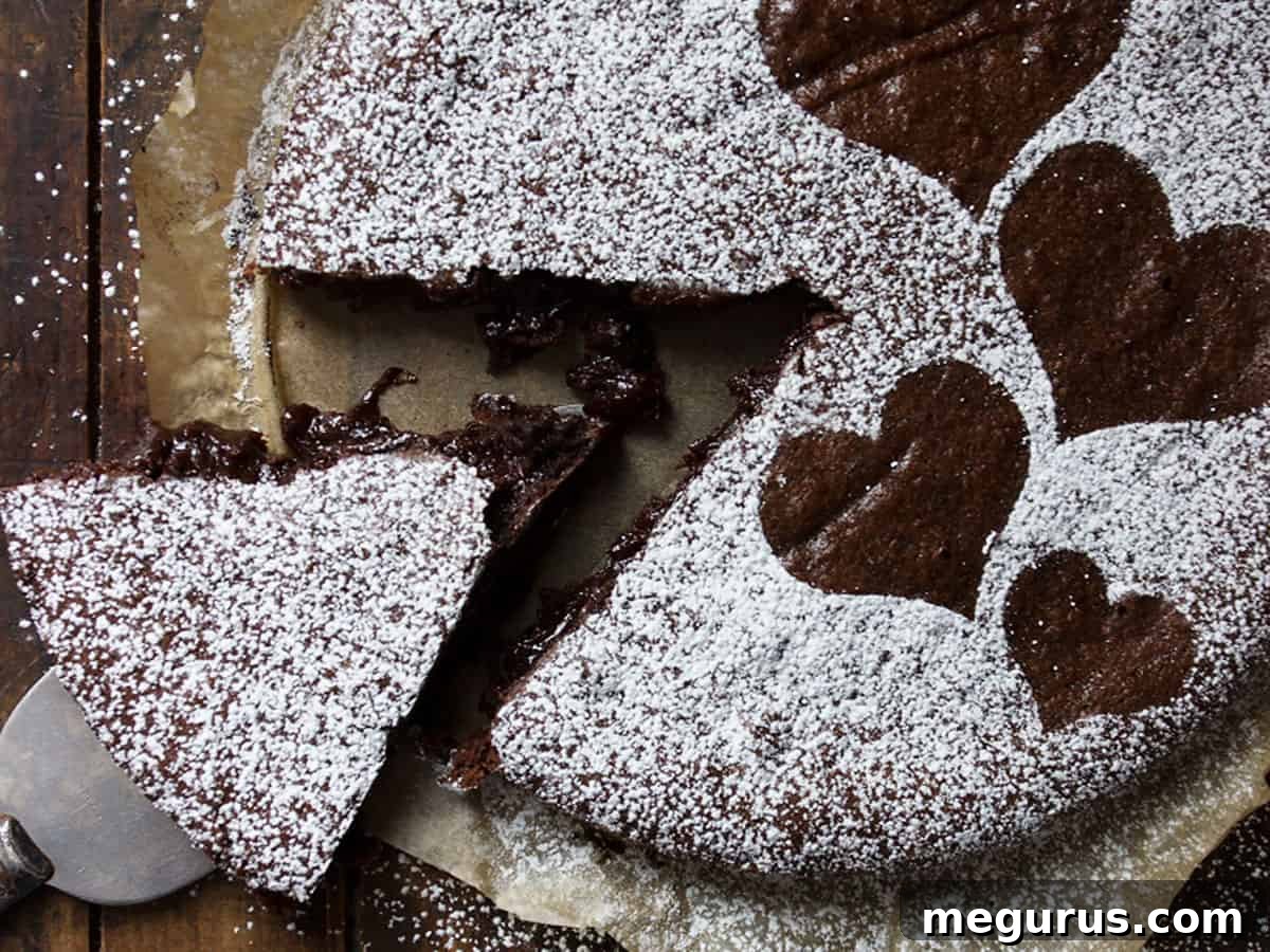 Sliced Swedish gooey chocolate cake, revealing its rich, moist interior