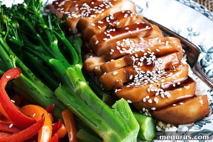 teriyaki chicken breasts on plate with vegetables