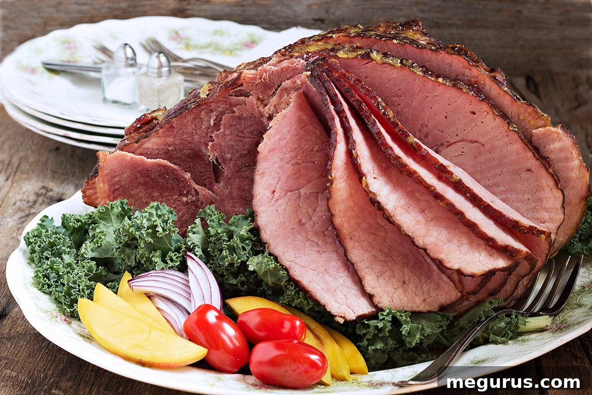 Mango Mustard Glazed Spiral Ham - A perfect holiday centerpiece with a tropical twist.