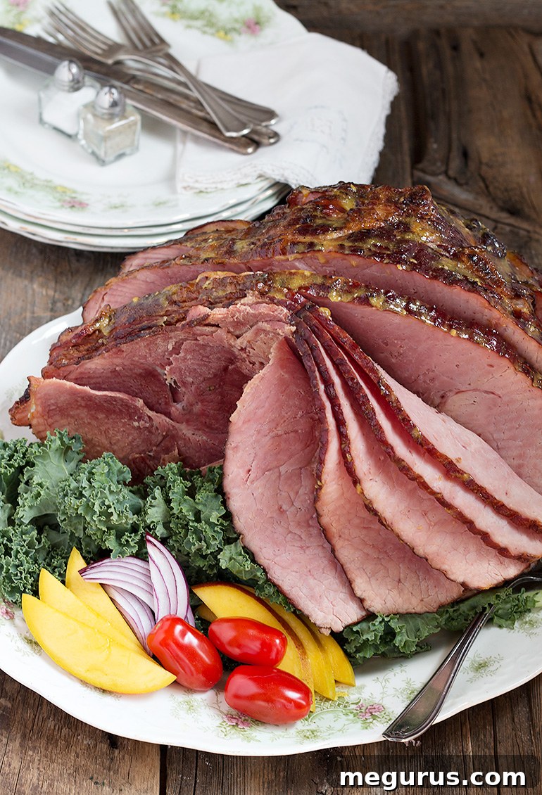 Close-up of Mango Glazed Ham slices, showing the caramelized glaze.