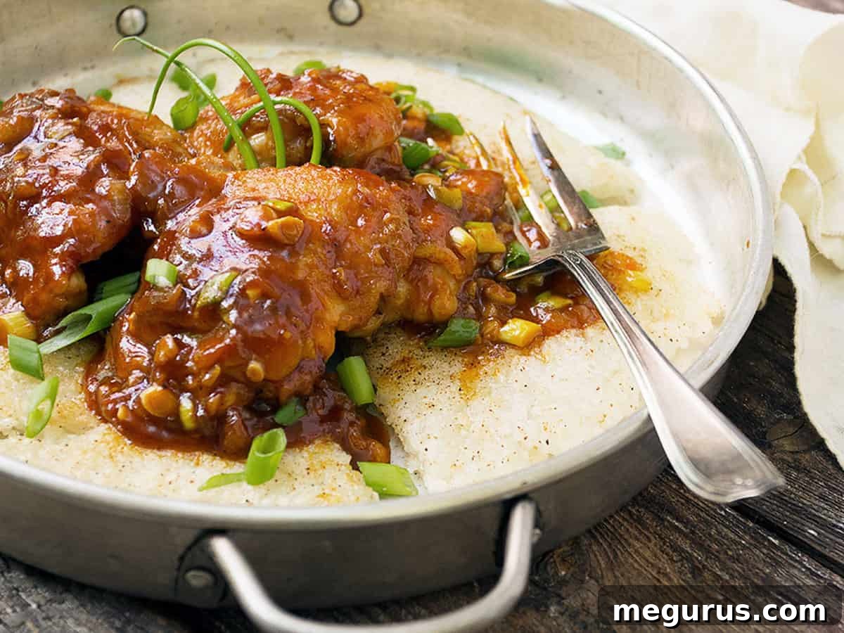 Spicy Korean Chicken with Crispy Rice in a pan, ready to serve.