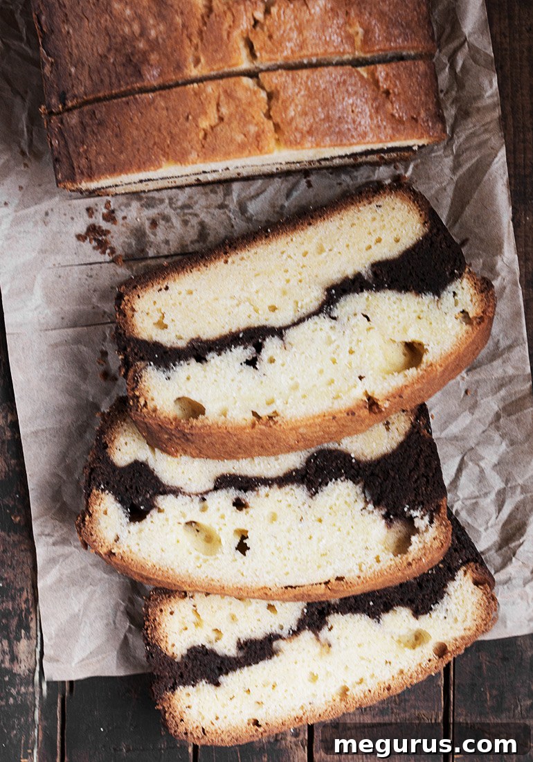 Vanilla Brownie Pound Cake Loaf, perfectly sliced to reveal the marble pattern