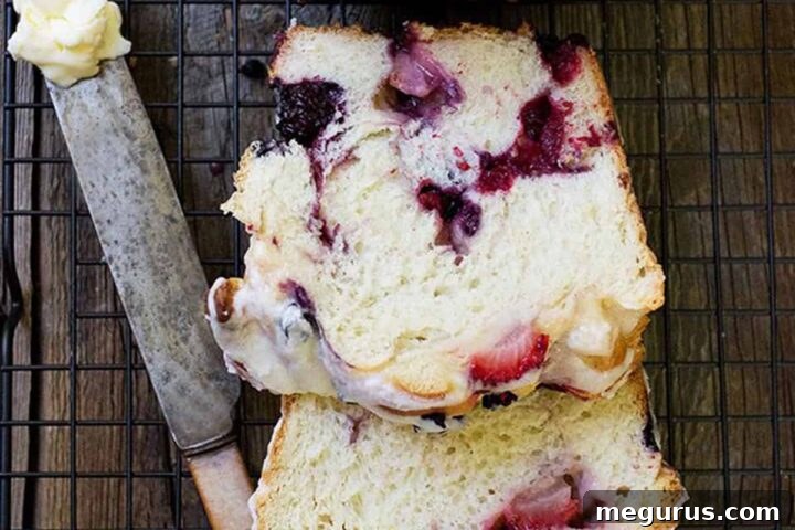 Glazed Summer Fruit Yeast Bread sliced on cooling rack