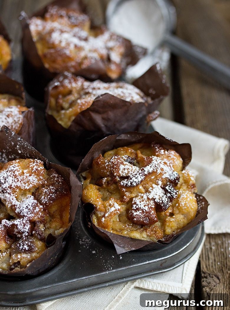 Close-up of baked Bread Pudding Muffins still in the muffin tin