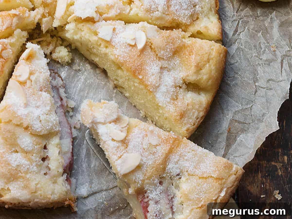 French pear cake sliced on parchment