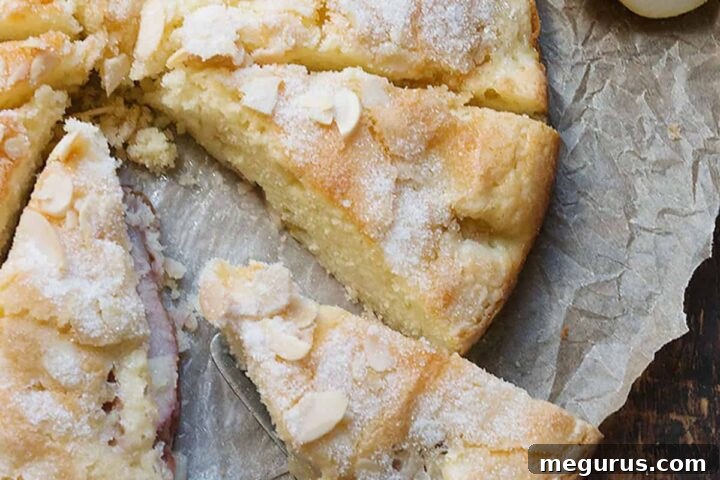 French pear cake sliced on parchment