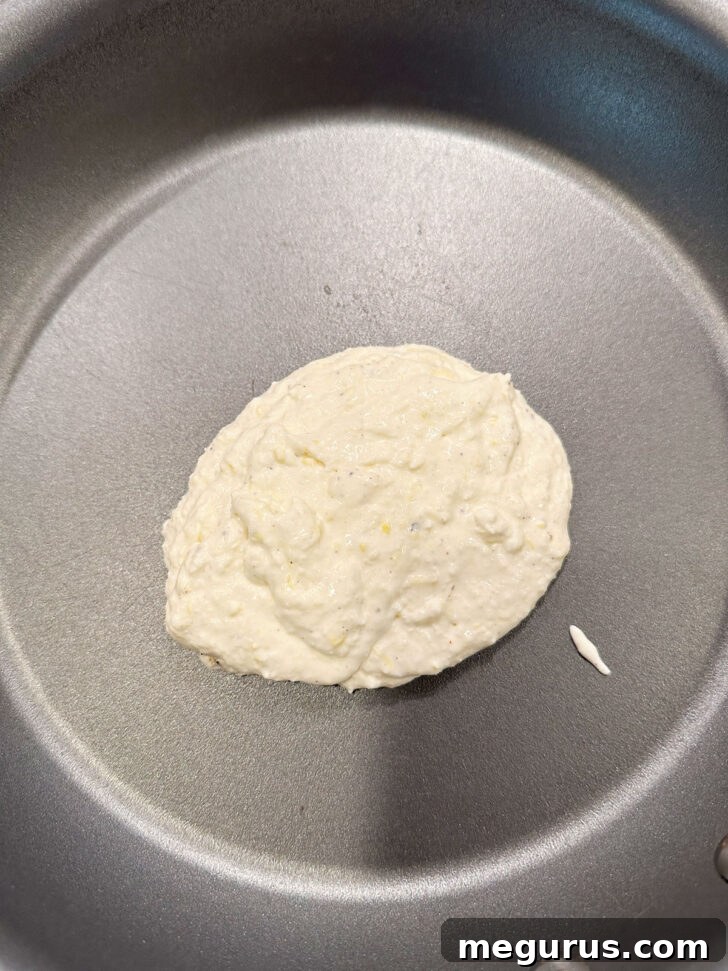 The assembled no-cook sauce sitting in a skillet on the stovetop.