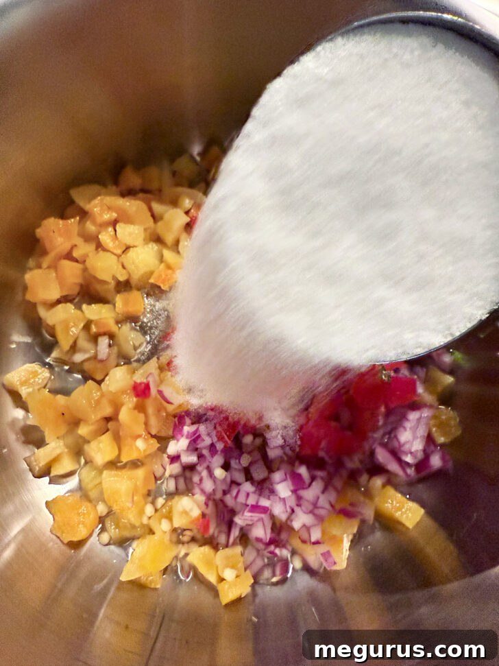 Apricot jalapeño jelly ingredients ready in a pot.
