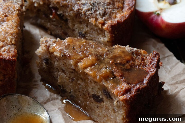 apple hazelnut cake sliced with toffee sauce