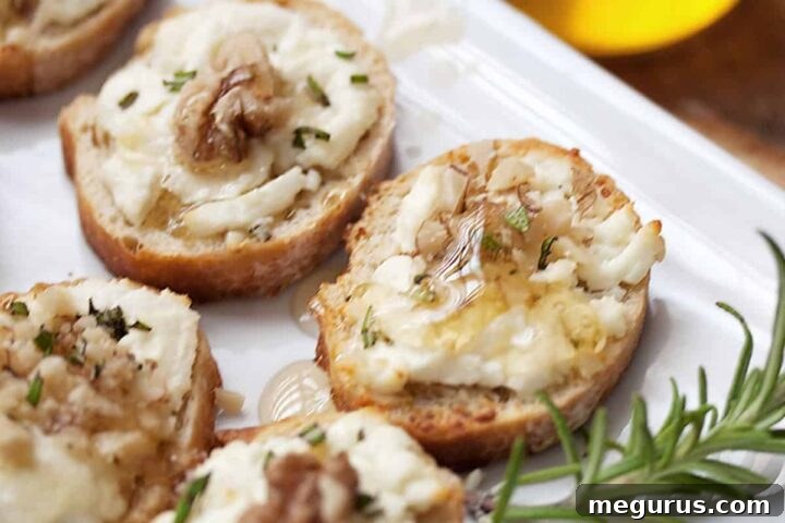 Goat Cheese Crostini with Honey on a serving platter
