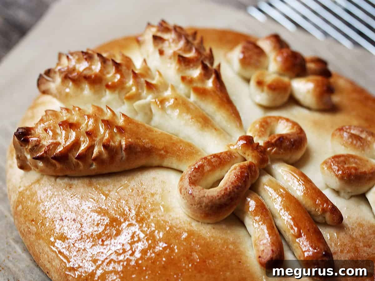 Bulgarian Christmas eve bread from overhead, decorated with dough shapes