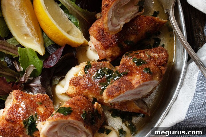 pork cordon bleu on serving platter with fork