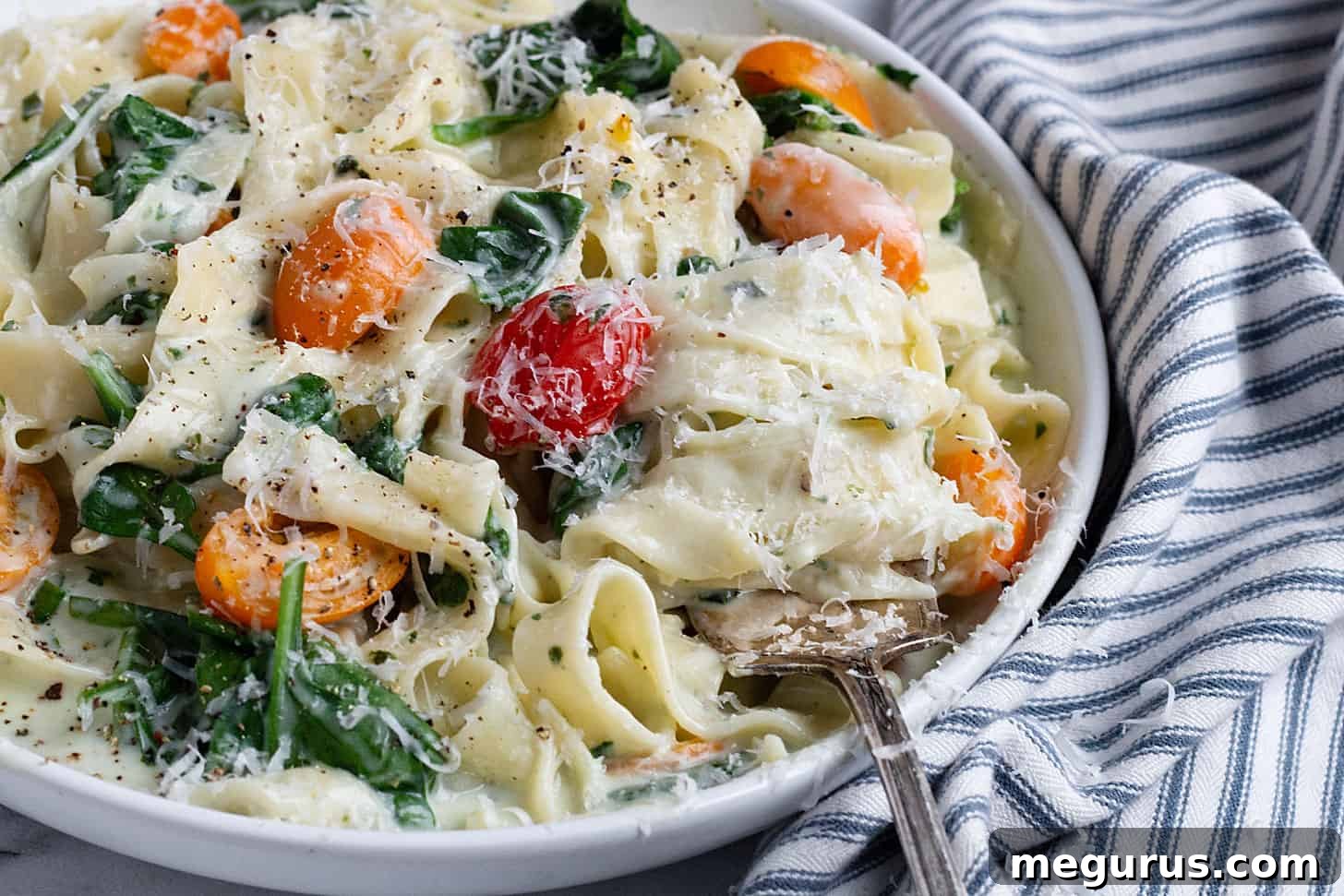 creamy goat cheese pasta in bowl