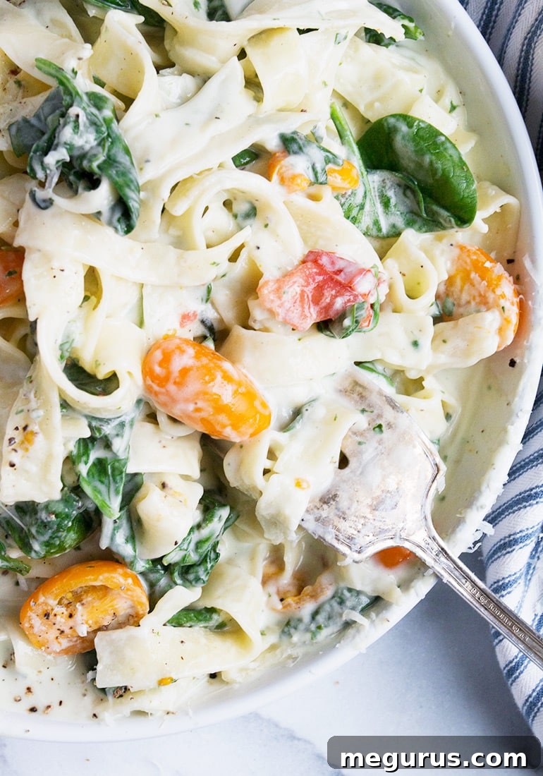 Creamy Goat Cheese Pasta with Spinach and Tomatoes