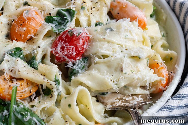 creamy goat cheese pasta in bowl