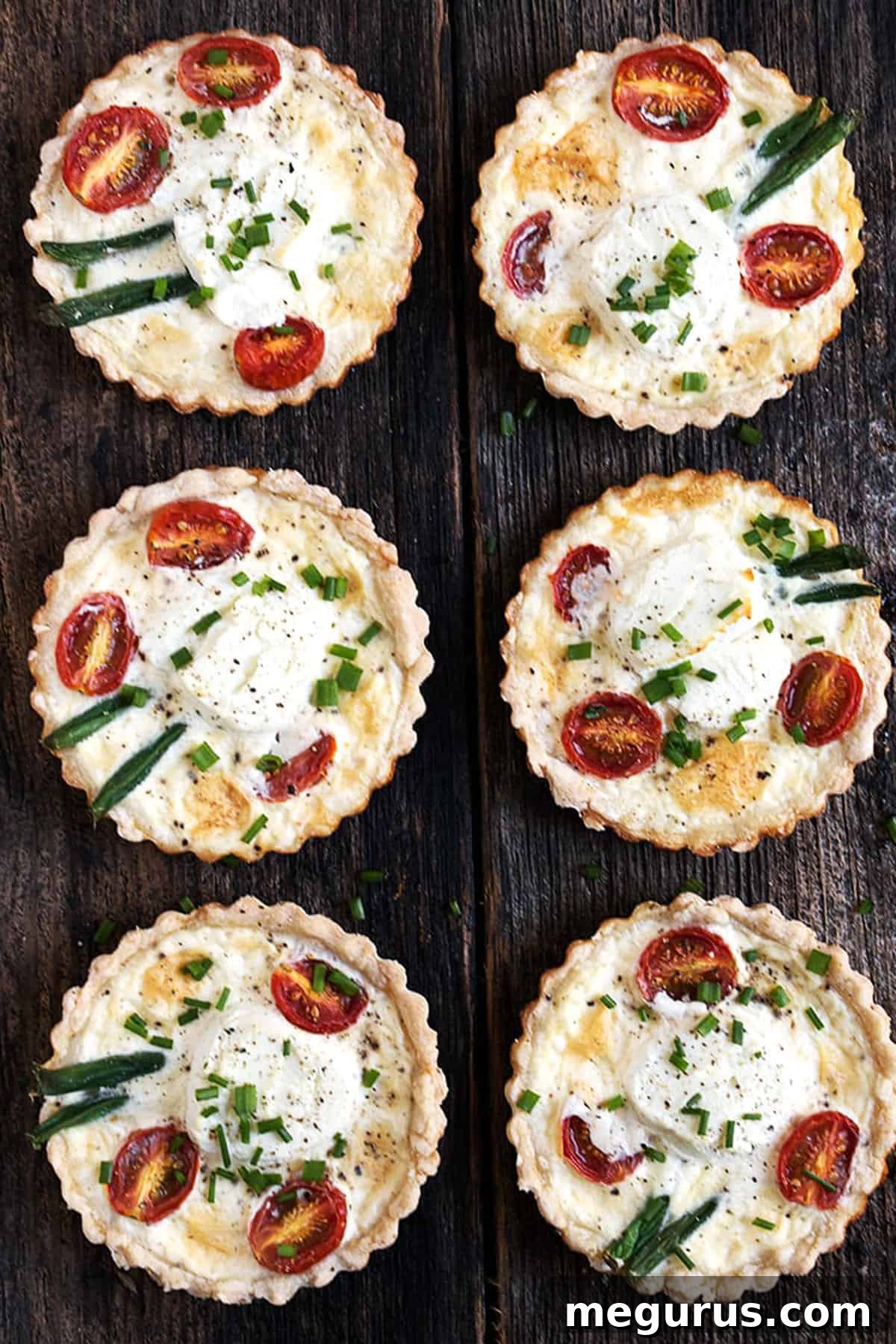 goat cheese tomato tarts on wood background
