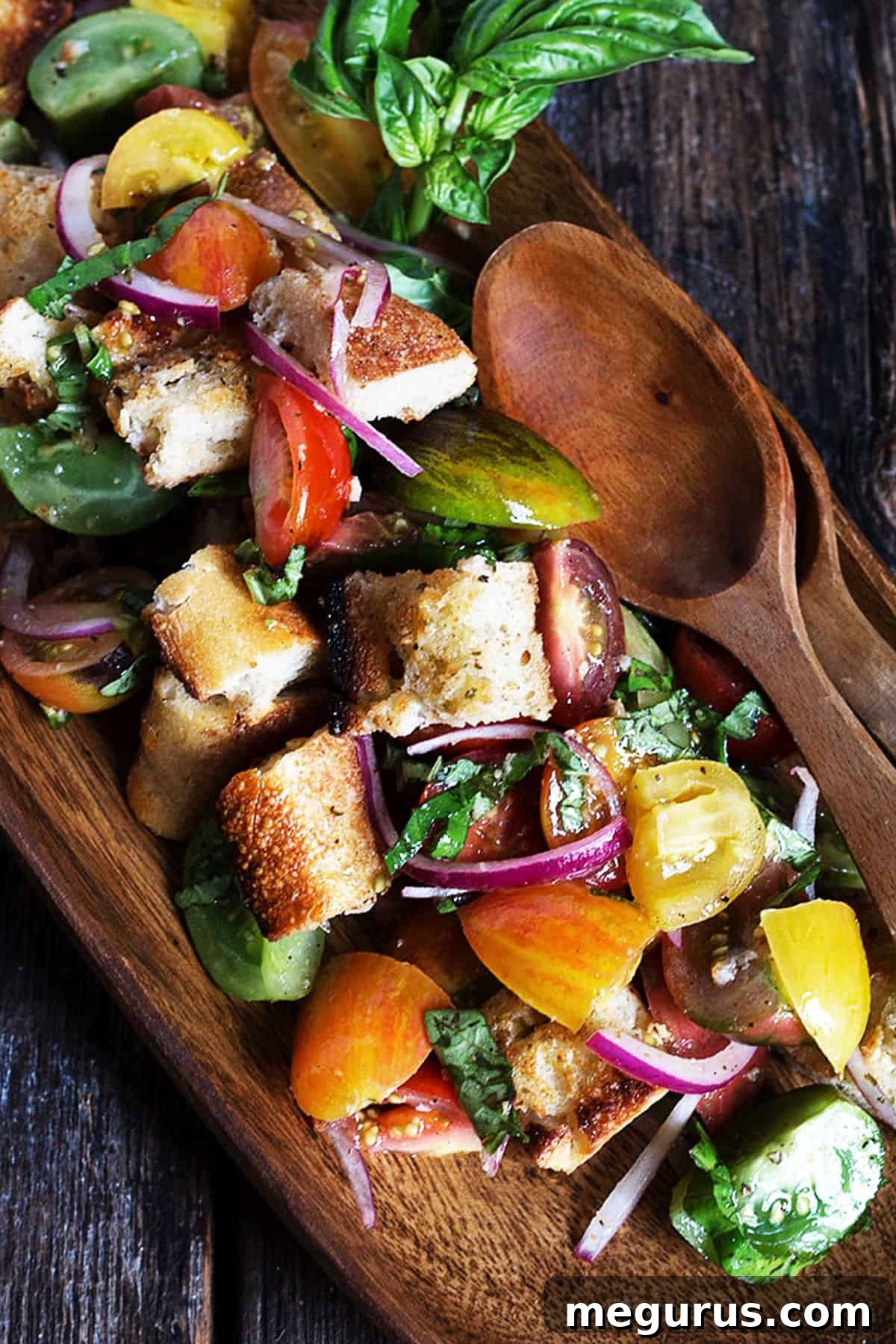 heirloom cherry tomato salad in wooden bowl
