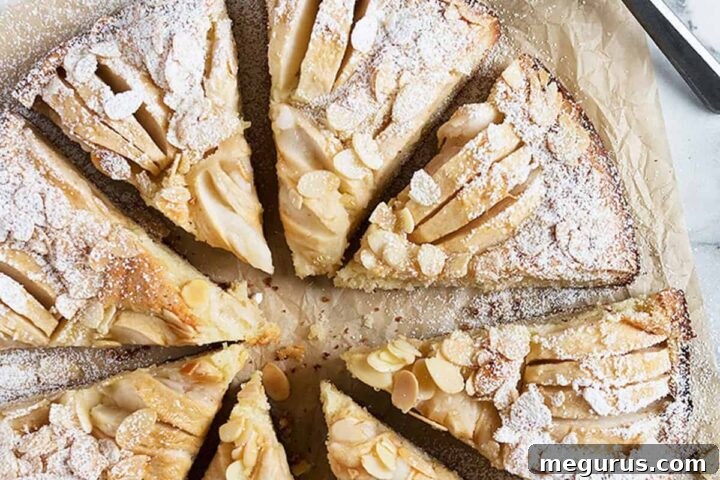 apple almond cake on parchment sliced
