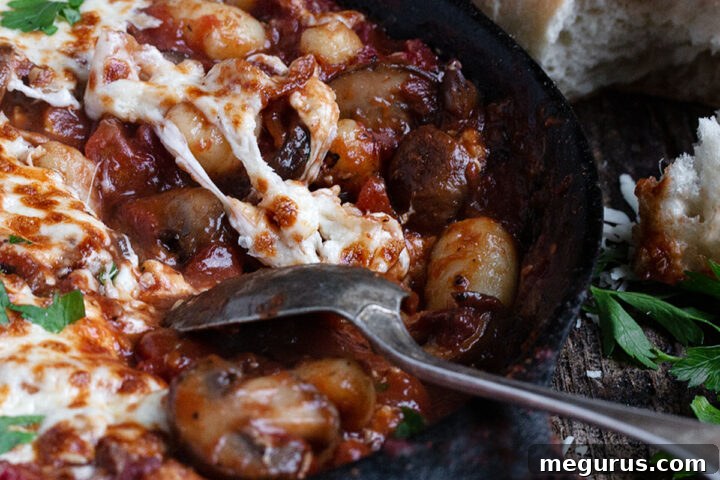 mushroom tomato gnocchi in cast iron skillet