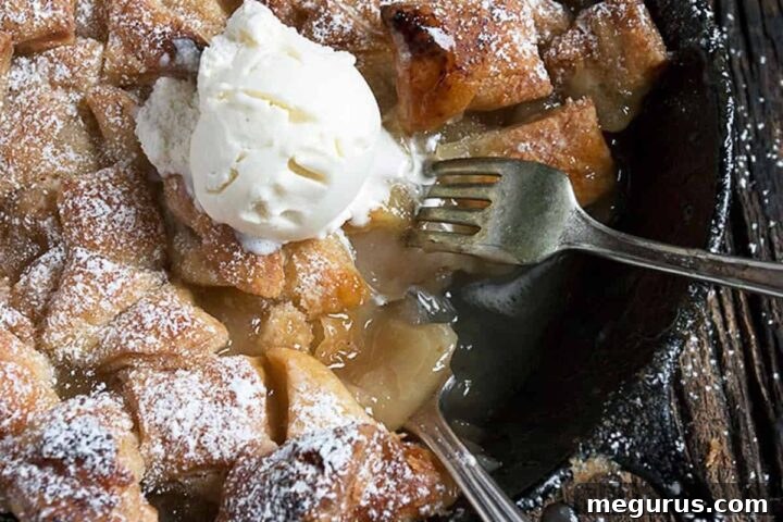 apple pandowdy in cast iron skillet, golden brown and bubbly